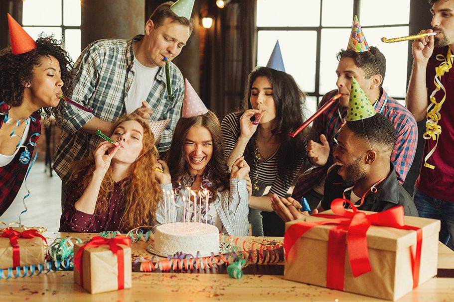 a group of friends celebrating a birthday